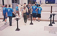Photo of students touring a facility Photo of students touring a facility