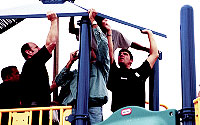 Photo of Volunteers Assembling Playground Equipment