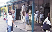 Photo of Volunteers Paintings the Recreation Center