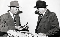 1950s photo of SDPD Detectives Checking Evidence