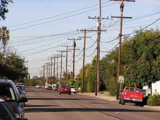 Photo of street with utility poles