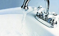 Photo of Water Running Into Sink