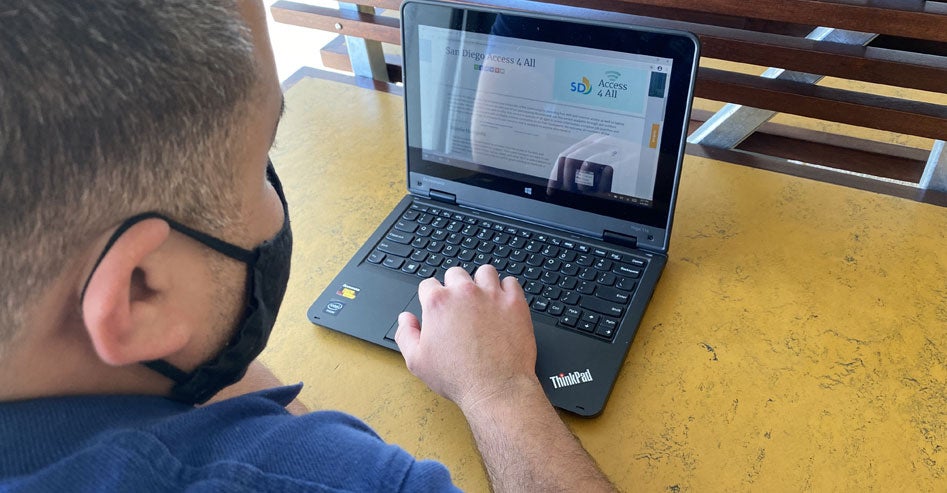 Library patron using a laptop