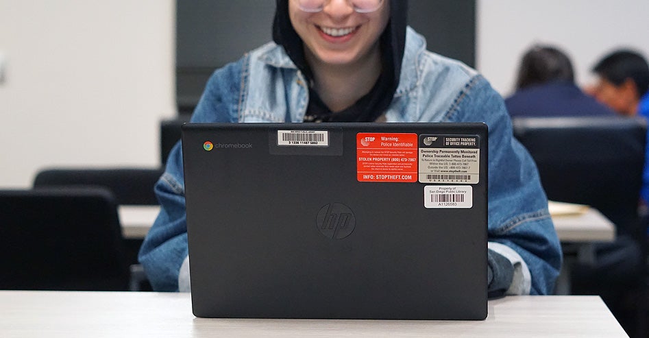 Library patron using a laptop