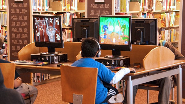 Children using computers at the Logan Heights Library