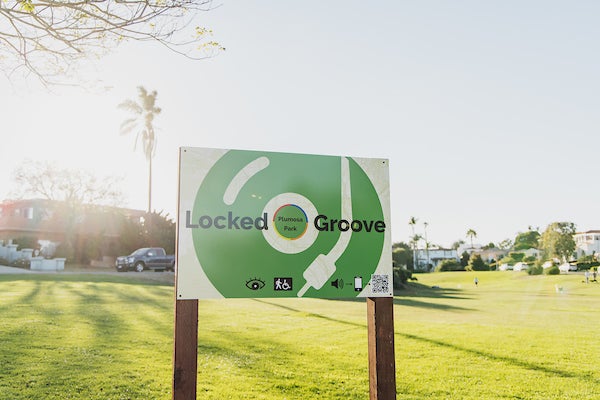 Park signage displaying the location of the Locked Groove art installation