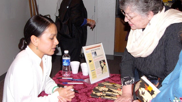 Author l thi diem thúy at a book signing at the Linda Vista Library