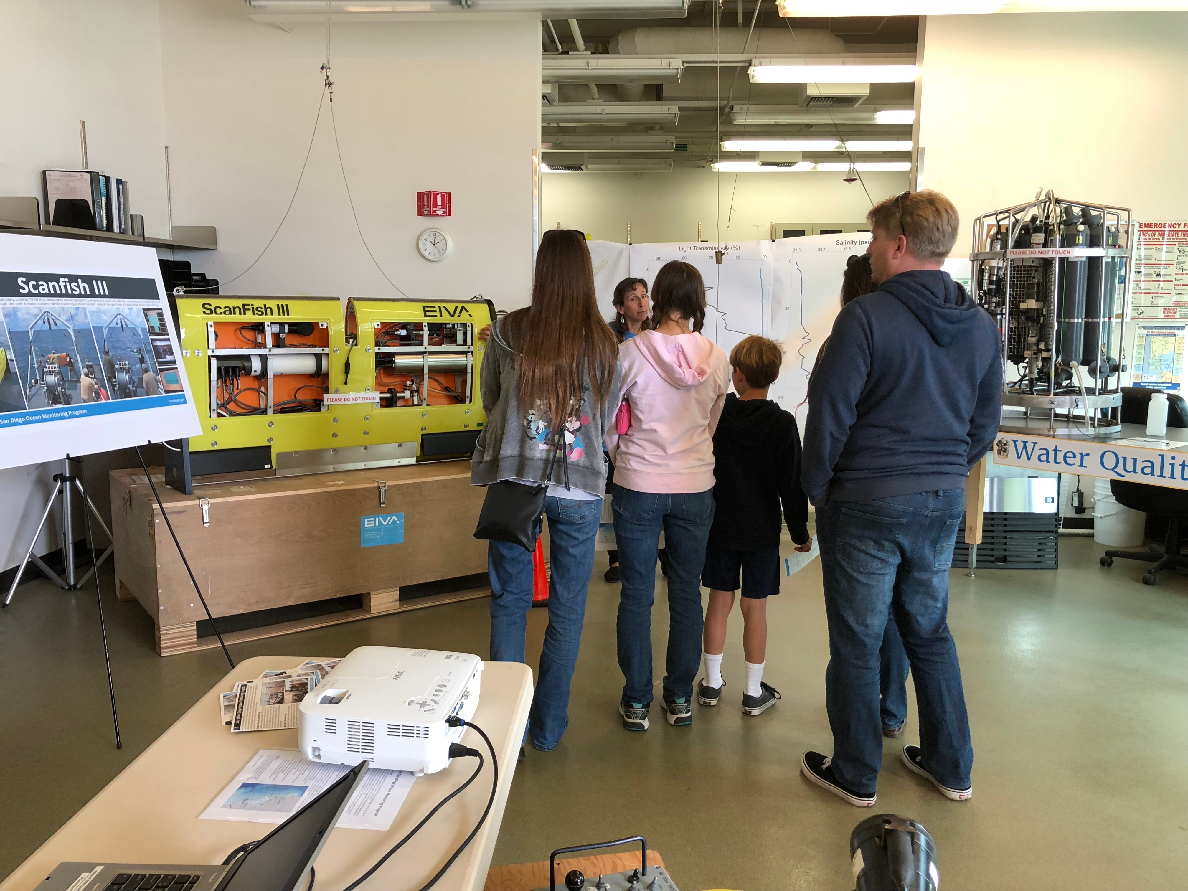 A marine biologist explains the use of the program's Scanfish, a remotely operated towed vehicle, to collect oceanographic data.