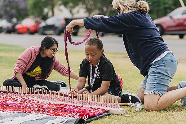 Park visitors enjoying the Collective Memory art installation