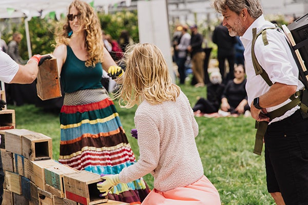 Park visitors participating in the Walking the Wall art performance