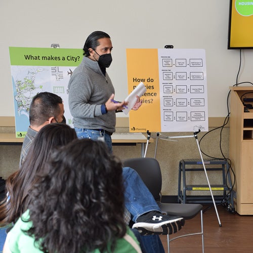 Planning coordinator leading a discussion with community members