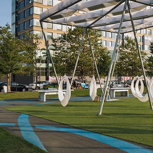 Artistic swings on display at a community park