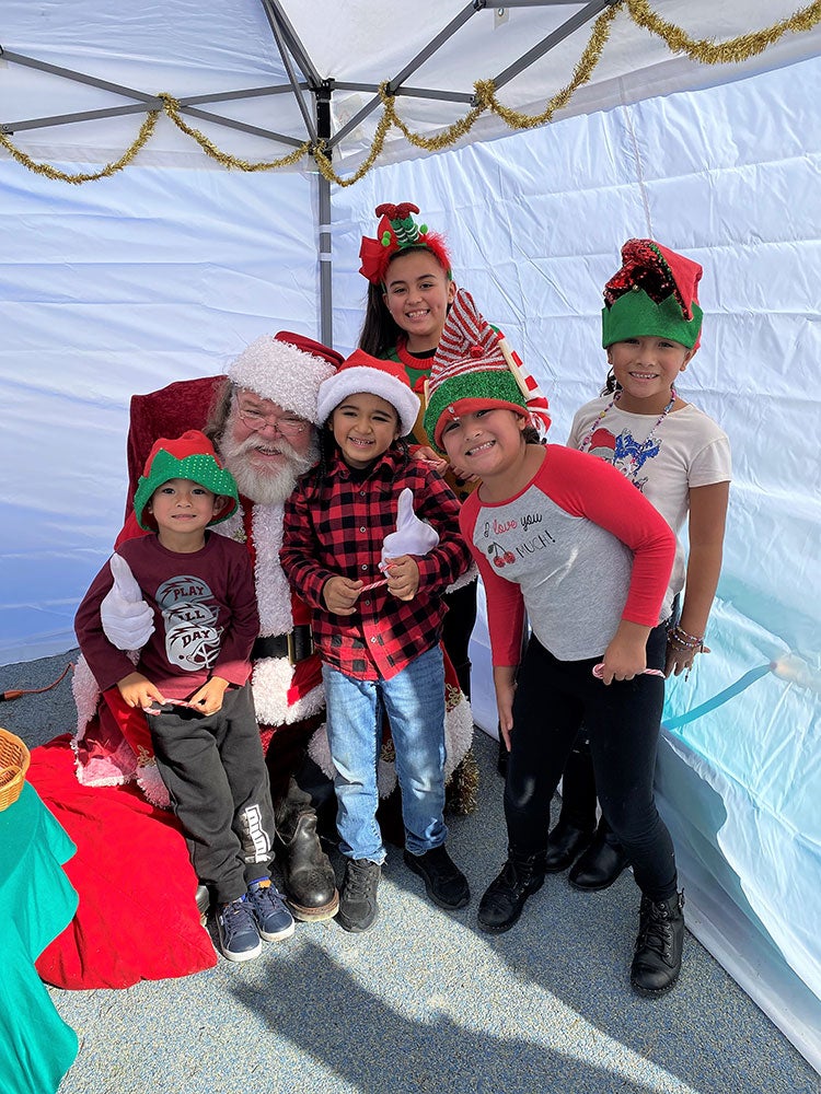 photo of children with Santa Claus