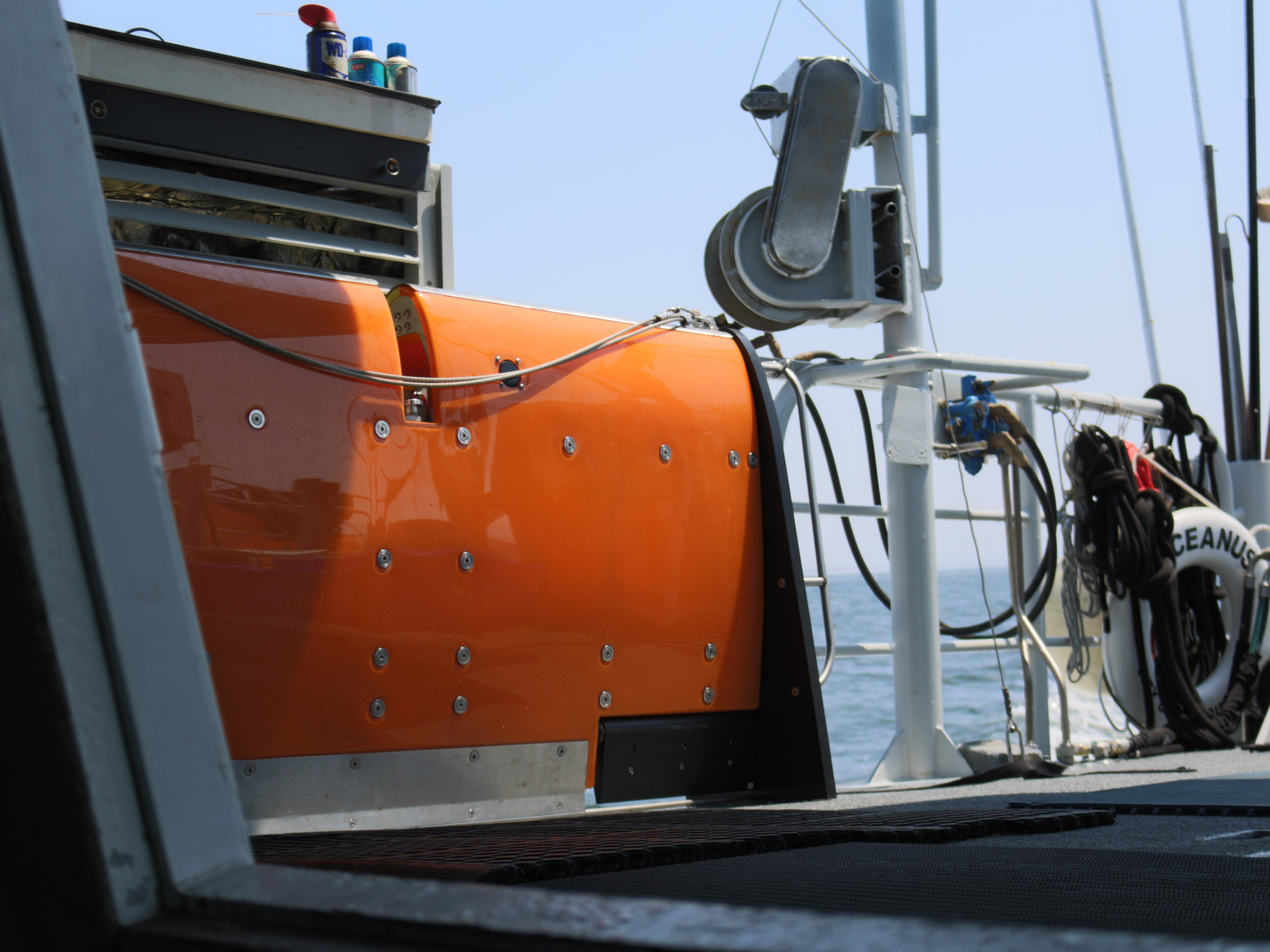 The Scanfish, a remotely operated towed vehicle sits on the aft deck before deployment. This instrument enhances the collection of water quality data and provides high-resolution maps of plume dispersion and location.