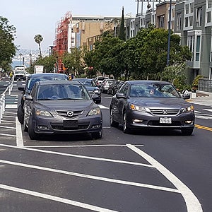 Cars parked along a downtown street