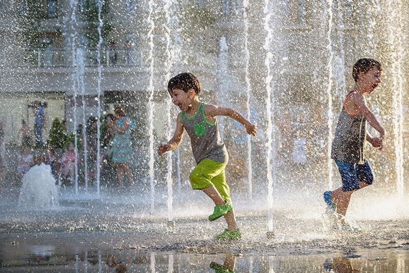 Children playing on a splash pad