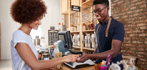 cashier accepting credit card