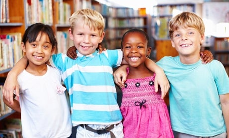 Four children smiling.
