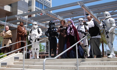 Star Wars characters posing in front of the library's steps.