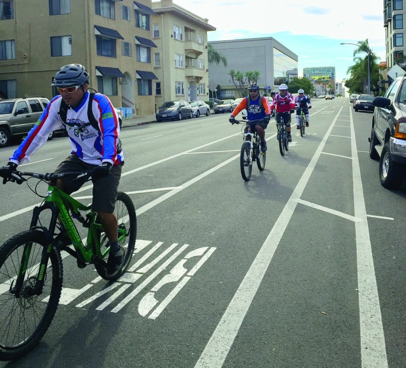 bicyclists riding on Fifth Avenue