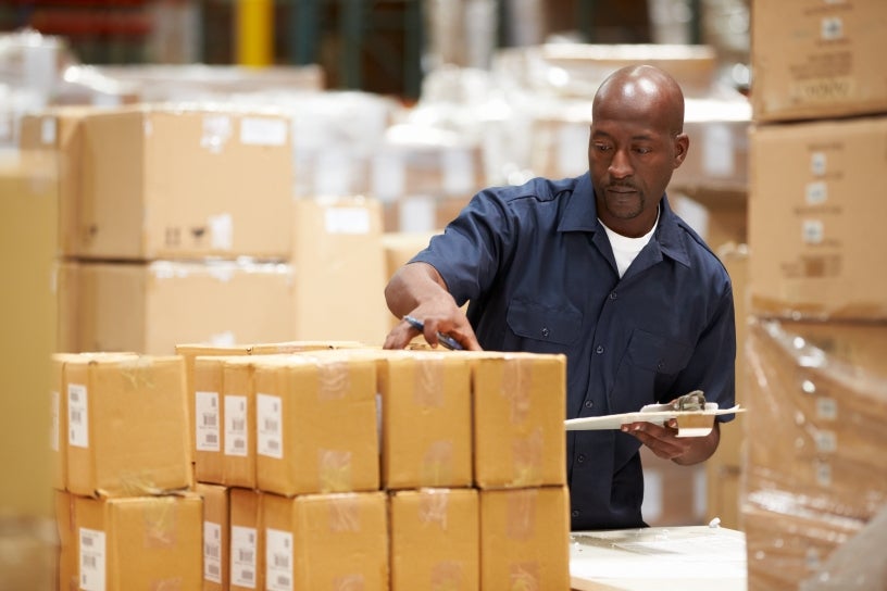 Stock worker in warehouse