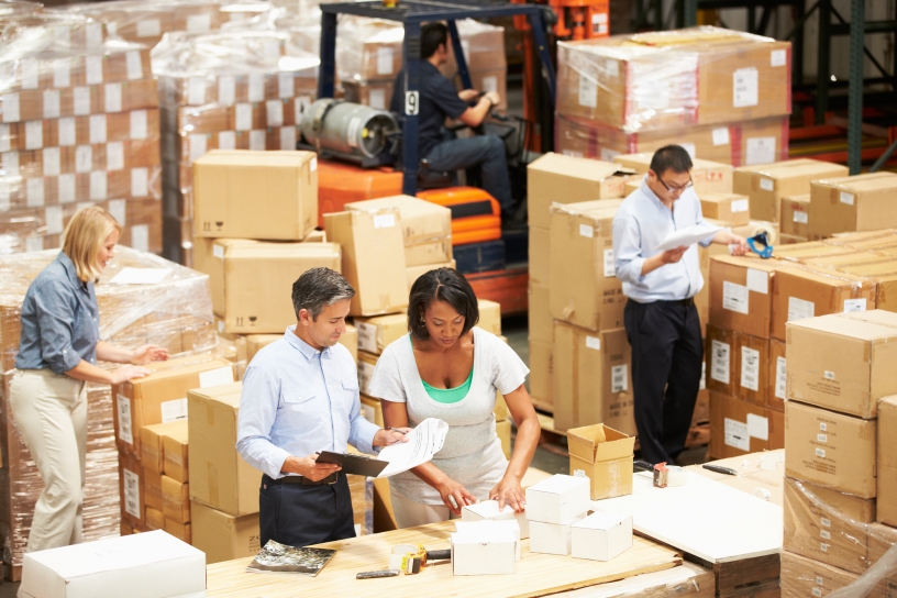 Workers preparing items in warehouse