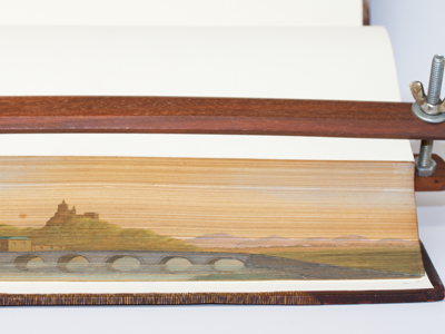 Image of a book with fore-edge painting of a bridge