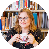 Photo of librarian holding mug