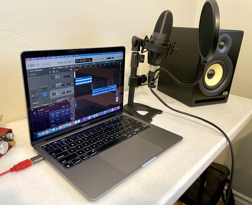 Laptop and Microphone set up for podcasting