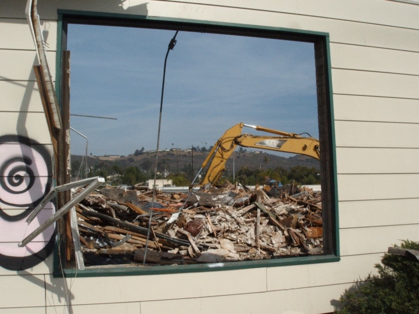 The familiar building at Broadway and Grove is gone and its history with it. (Helen Ofield)