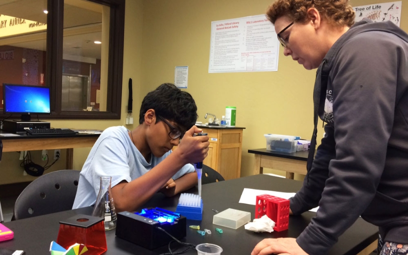 Student and STEAM coach working in Bio Lab at the La Jolla Library