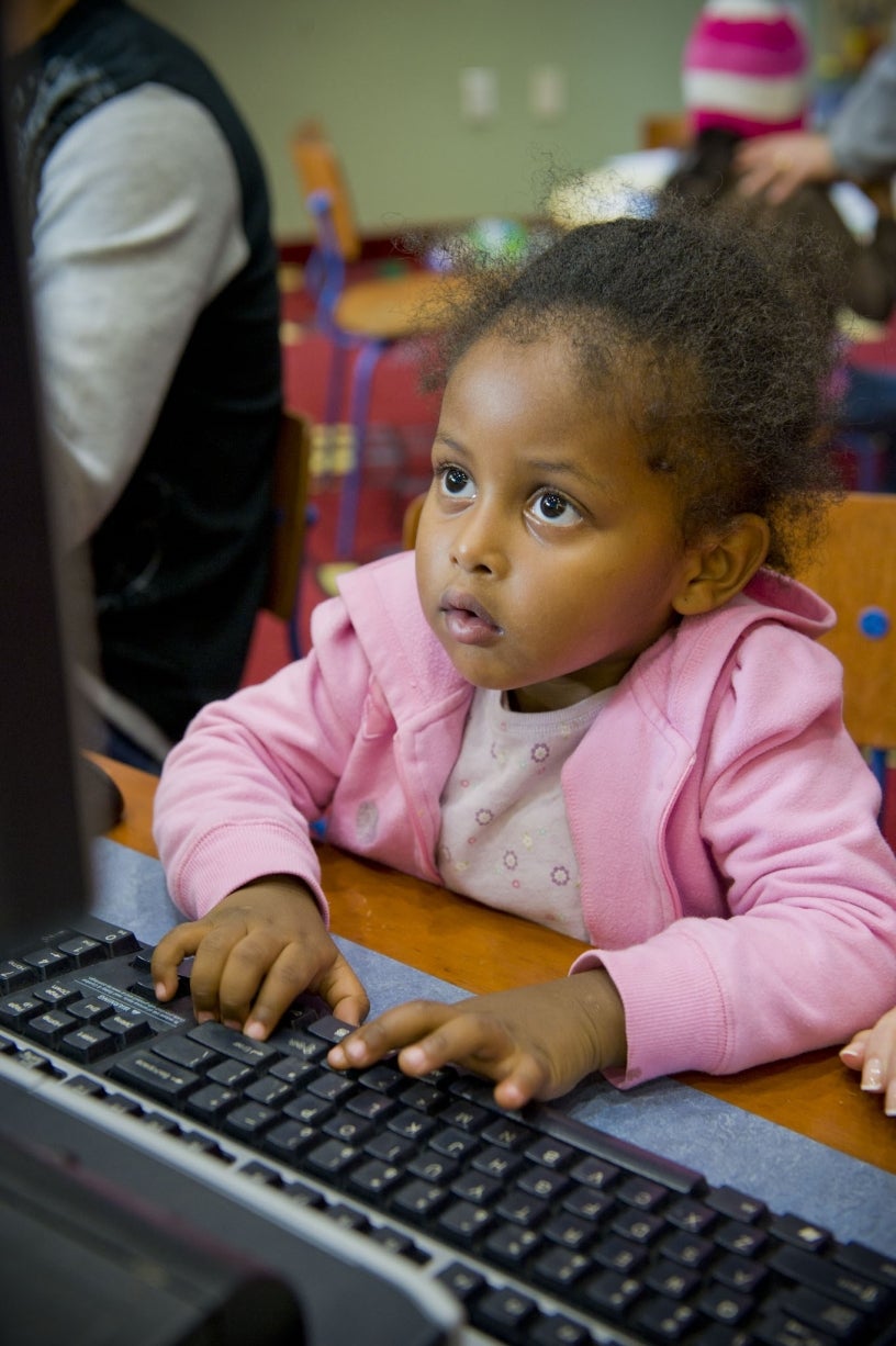 Child on a public library computer