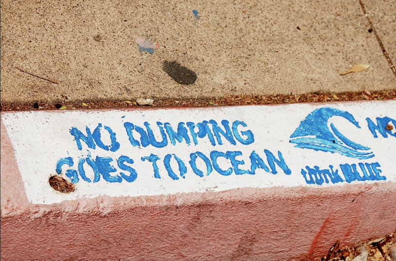 No Dumping sign on pavement