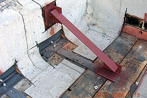 An example of roof parapet bracing and roof-to-wall anchor for URM buildings. Roof-to-wall anchors tie the roof diaphragm and the URM walls together minimizing risk of potential separation of the URM walls and roof during an earthquake.