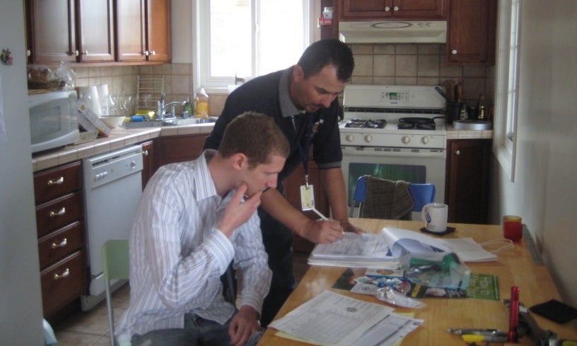 doing a water survey in a customer's kitchen