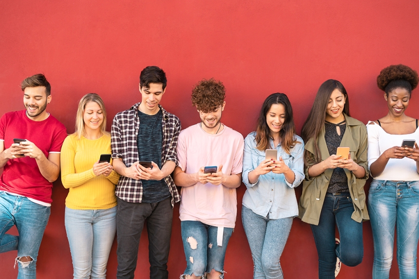 line of young people on mobile devices