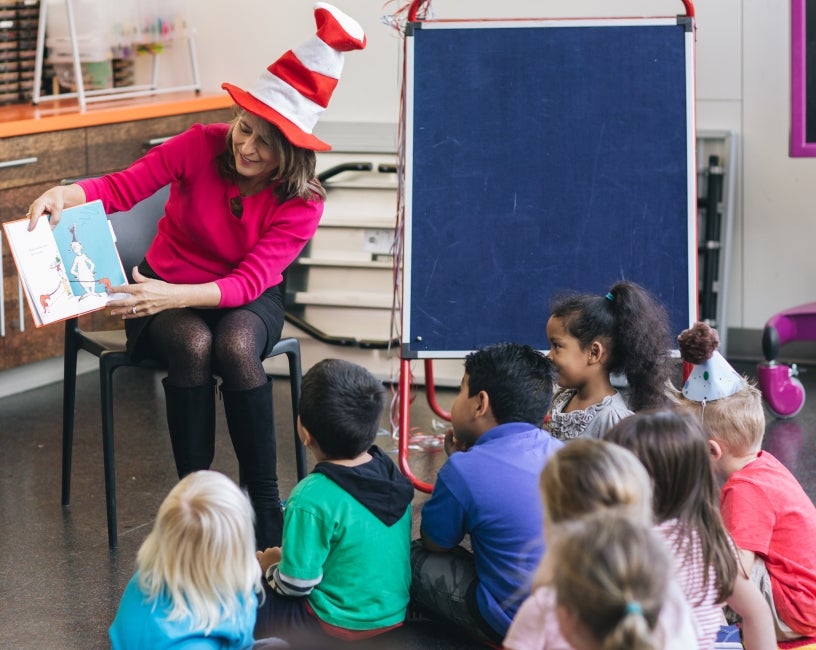 Councilmember Lorie Zapf reading Green Eggs and Ham