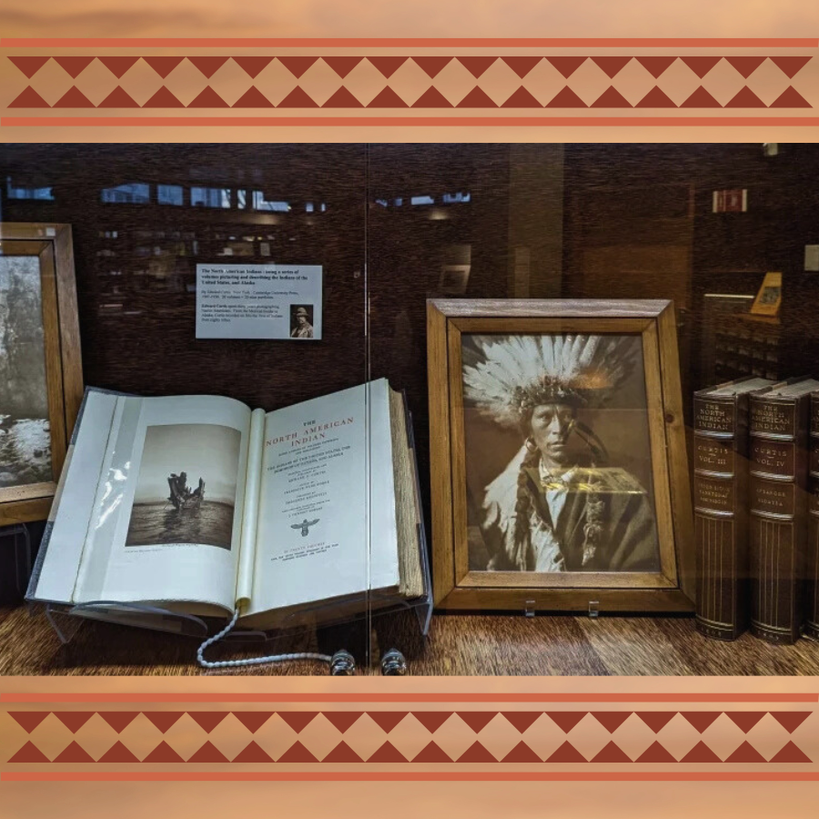 Part of Edward Curtis' "The North American Indian" collection is photographed in the Central Library’s Hervey Family Rare Book Room. A double row of umber triangles serves as a border at the top and bottom of the image.
