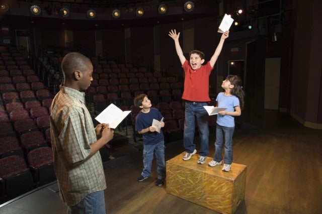 Kids practicing for a play