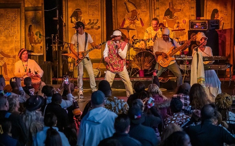 A musical performance at the WorldBeat Cultural Center