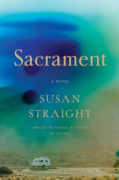 The cover features a white trailer in a desert field. Above the image the title is in letters surrounded swirling teal and dark blue clouds.