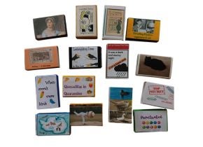 A series of books made from matchboxes by the artist