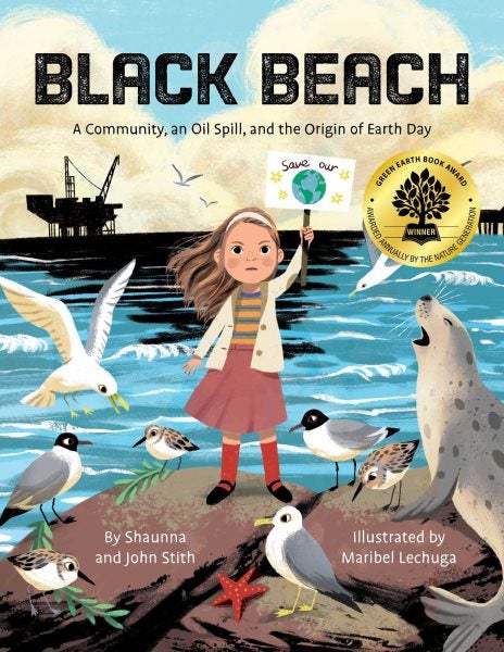 The cover features an illustration of a young girl standing on rocks with the ocean in the background. An oil rig is in the distance. The girl is surrounded by sea birds and a seal. She holds a sign which states, “save our planet.” 
