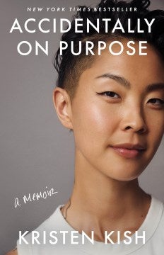 The cover features a headshot of the author. The author is wearing a white tank top, which reveals a neck tattoo. She has a short mohawk. 