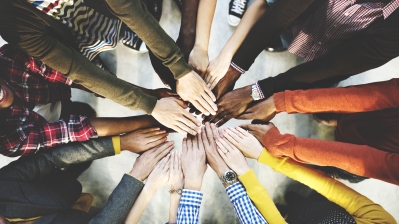Group of diverse hands together