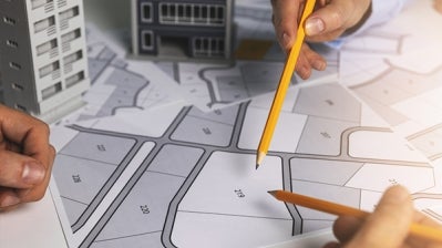 People reviewing zoning plans