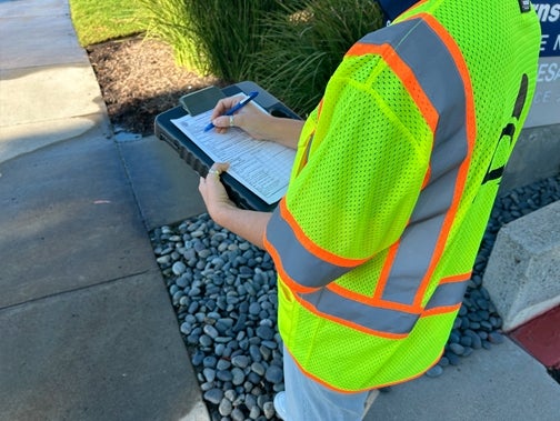 Inspector with checklist