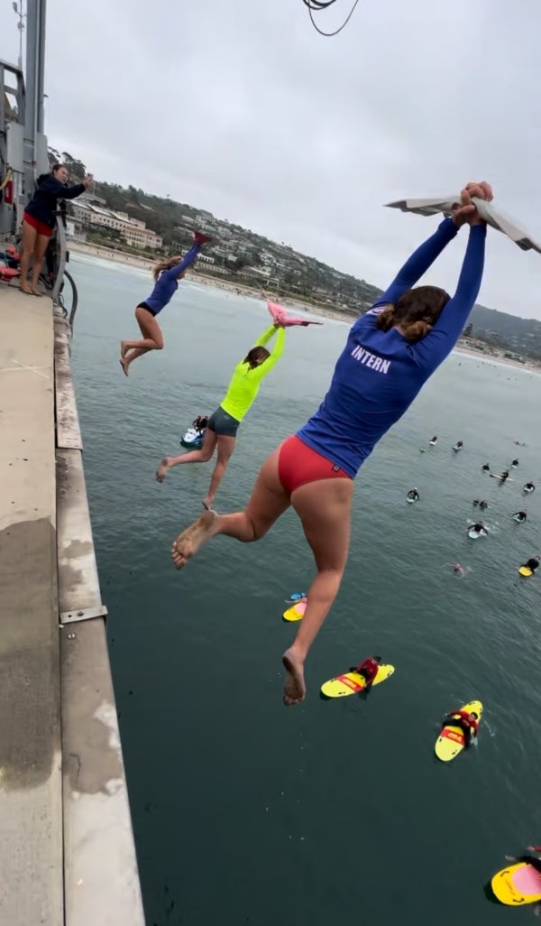 interns jumping Scripps Pier