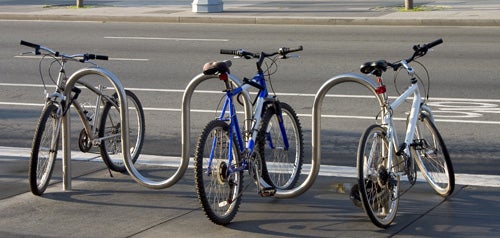 Bicycle rack with three bikes