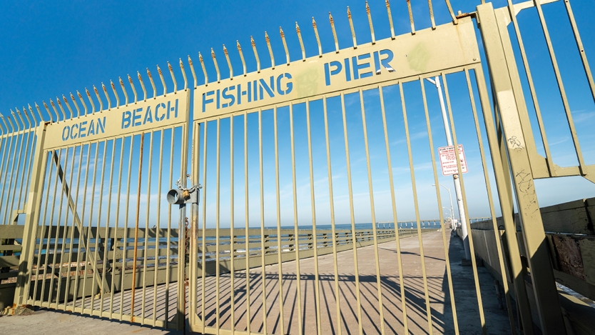 entrance of the ocean beach pier with closed gates